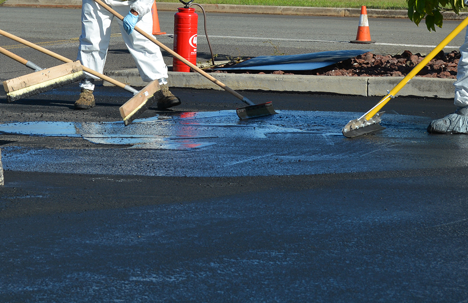 NAVFAC Hawaii Personnel Train with New Pavement Sealing Machine